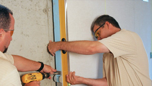 installing a basement wall finishing system in West Mifflin